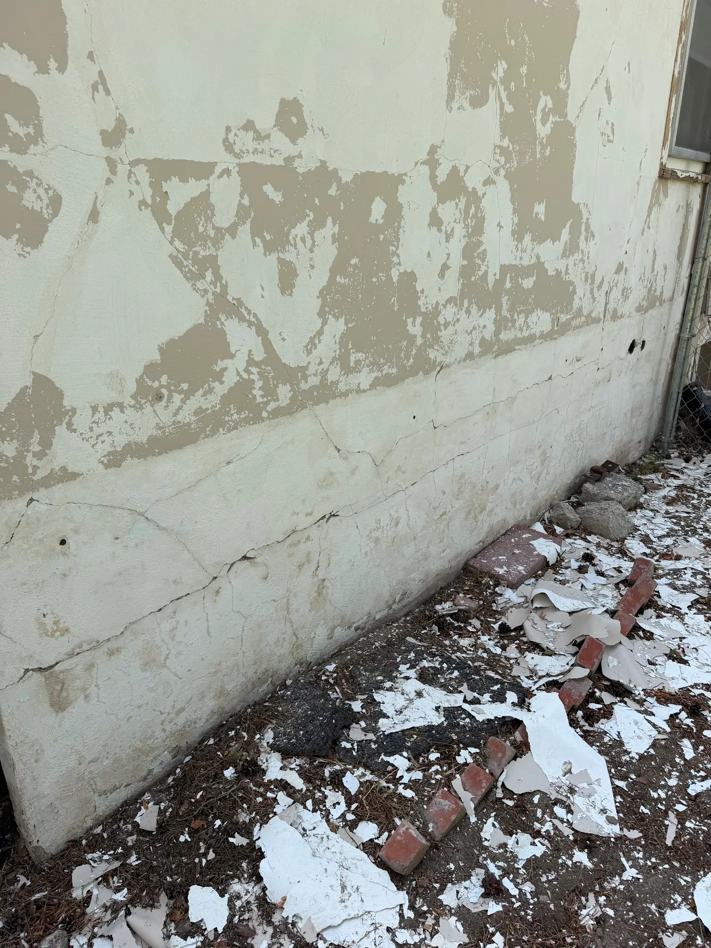 Loose exterior coating removed during surface preparation